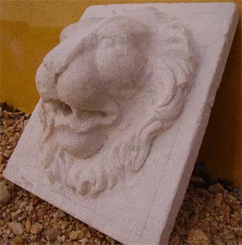 Mascarons tte de lion en pierre