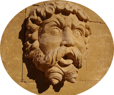 mascarons : Bacchus en pierre d'Estaillade patin  l'ocre de Roussillon